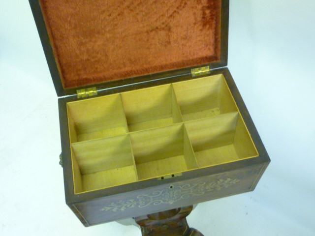 A REGENCY ROSEWOOD AND BRASS INLAID TEAPOY of sarcophagus form Image