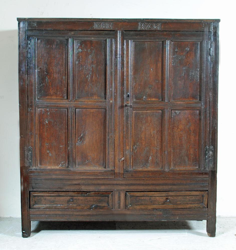 A QUEEN ANNE OAK LIVERY CUPBOARD Image