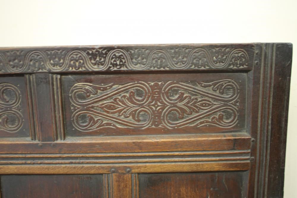 A GEORGE III OAK SETTLE Image