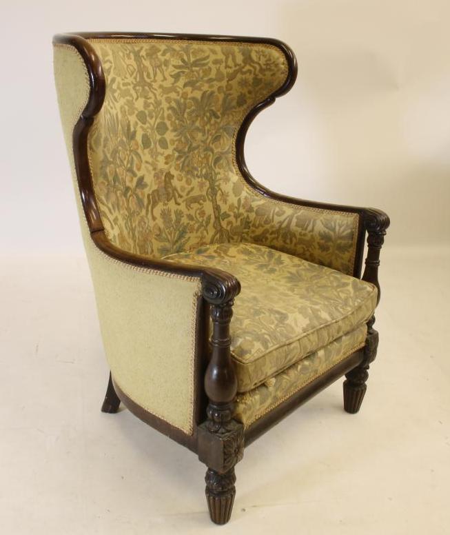 A WILLIAM IV MAHOGANY FRAMED WING ARMCHAIR Image