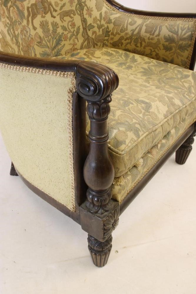 A WILLIAM IV MAHOGANY FRAMED WING ARMCHAIR Image