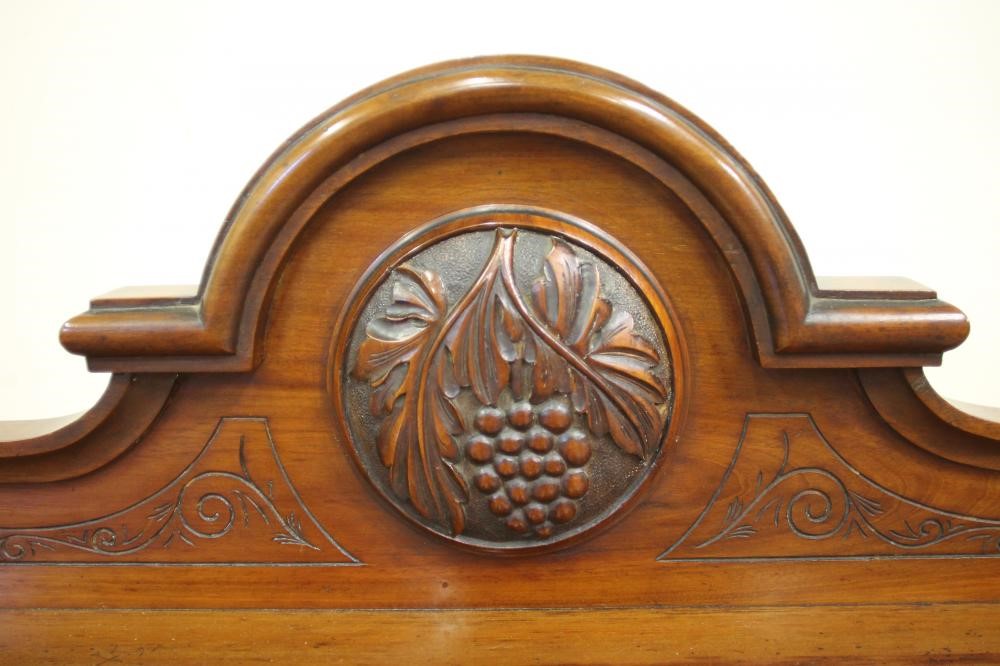 A VICTORIAN MAHOGANY THREE TIER BUFFET of rounded oblong form Image