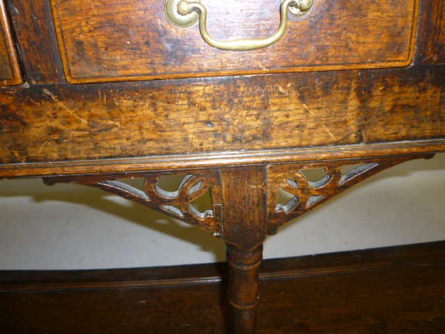 A VICTORIAN WALNUT MUSIC CABINET of rounded oblong form Image