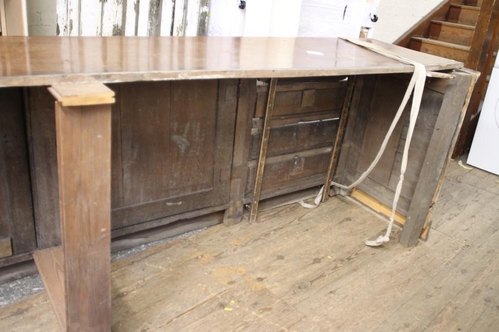 A LARGE AND IMPRESSIVE OAK ENCLOSED DRESSER Image