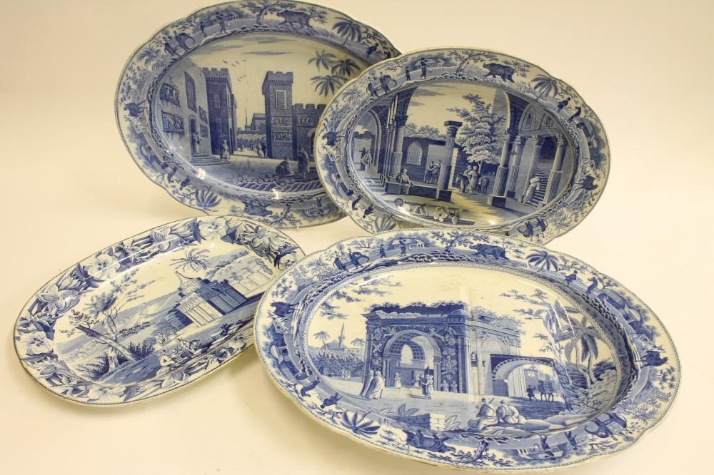 A COLLECTION OF NINE VARIOUS BLUE AND WHITE PRINTED EARTHENWARE MEAT PLATES including "Pashkov Image