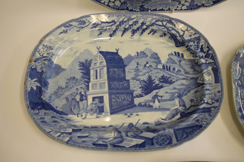 A COLLECTION OF NINE VARIOUS BLUE AND WHITE PRINTED EARTHENWARE MEAT PLATES including "Pashkov Image