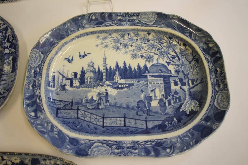 A COLLECTION OF NINE VARIOUS BLUE AND WHITE PRINTED EARTHENWARE MEAT PLATES including "Pashkov Image