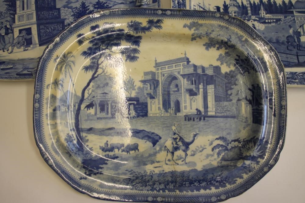 A COLLECTION OF NINE VARIOUS BLUE AND WHITE PRINTED EARTHENWARE MEAT PLATES including "Pashkov Image