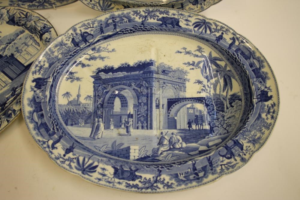 A COLLECTION OF NINE VARIOUS BLUE AND WHITE PRINTED EARTHENWARE MEAT PLATES including "Pashkov Image