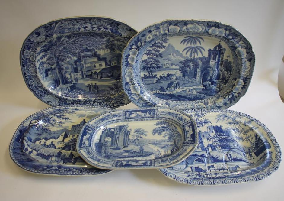 A COLLECTION OF FIVE BLUE AND WHITE PRINTED EARTHENWARE MEAT PLATES including Adams "Cowherds near Image