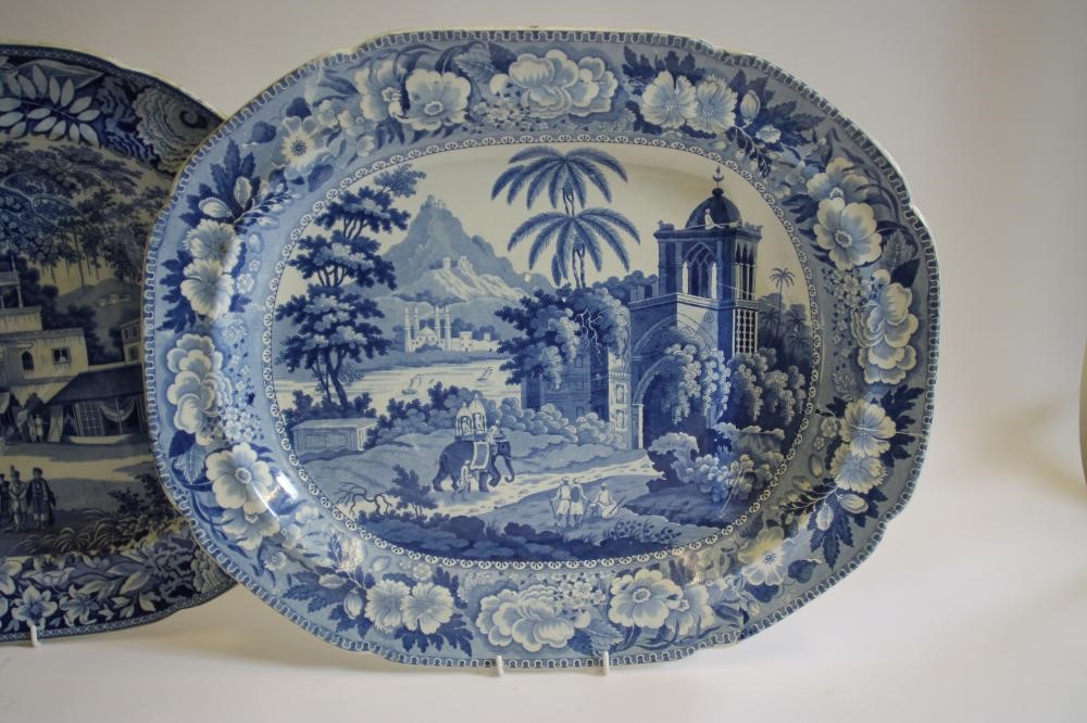 A COLLECTION OF FIVE BLUE AND WHITE PRINTED EARTHENWARE MEAT PLATES including Adams "Cowherds near Image