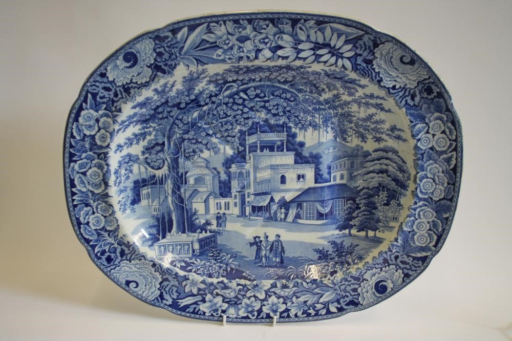 A COLLECTION OF FIVE BLUE AND WHITE PRINTED EARTHENWARE MEAT PLATES including Adams "Cowherds near Image
