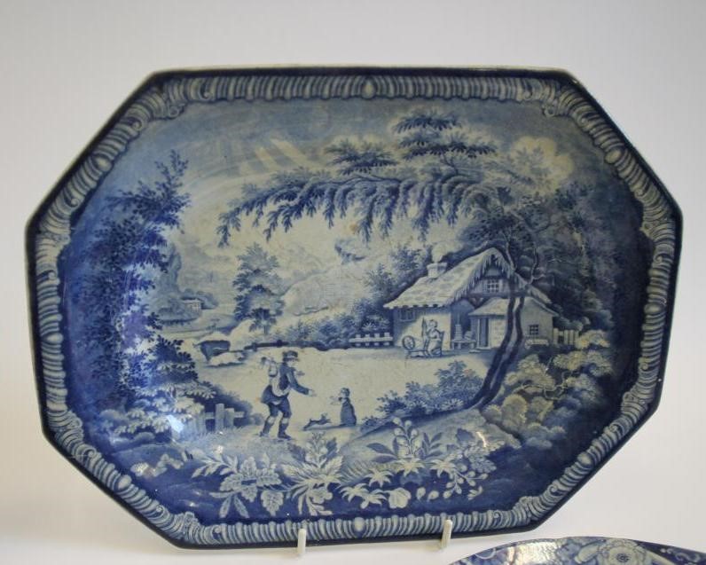 A COLLECTION OF EIGHT BLUE AND WHITE PRINTED EARTHENWARE BOWLS Image