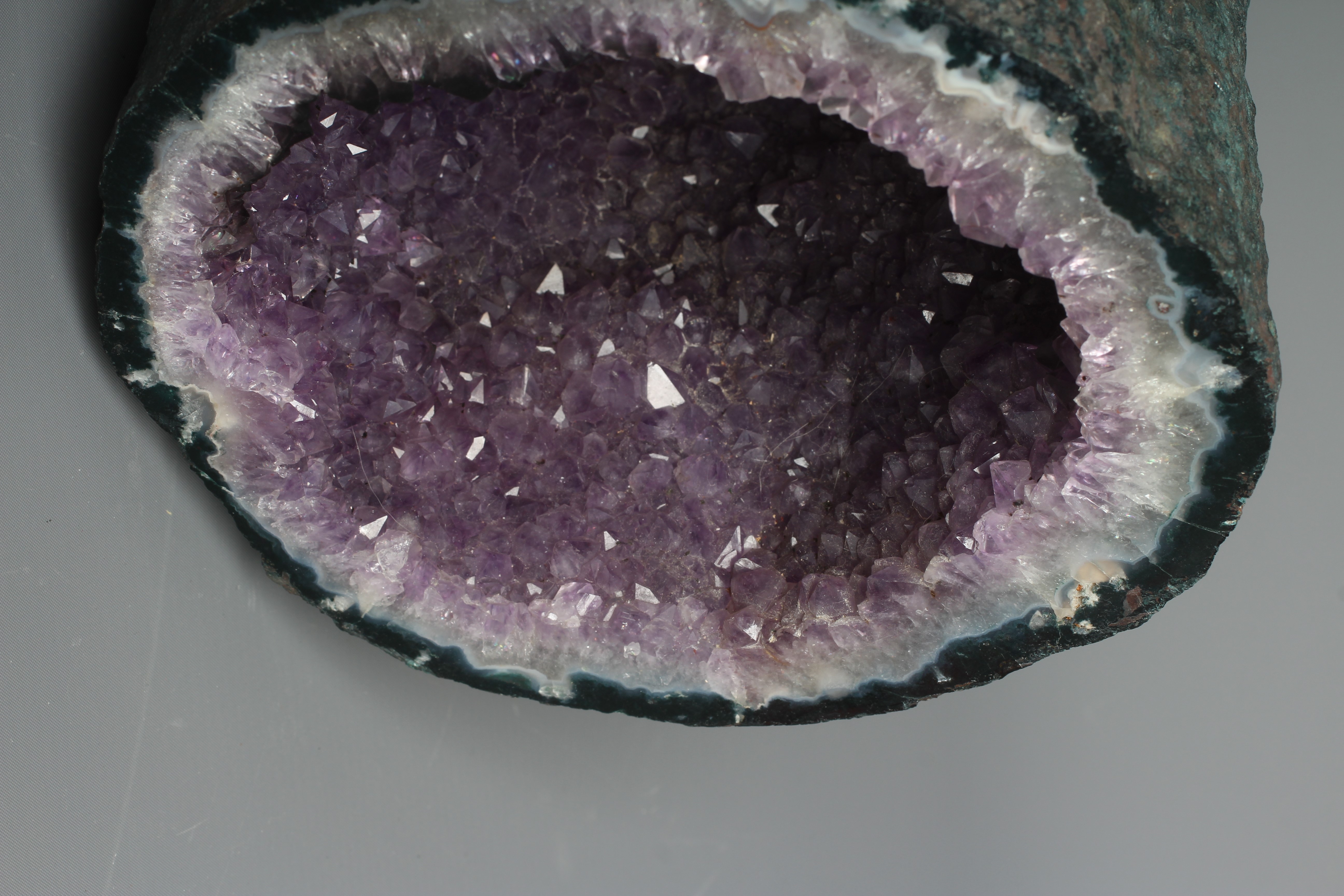 A large amethyst tunnel geode, cut at both ends, 7 1/2