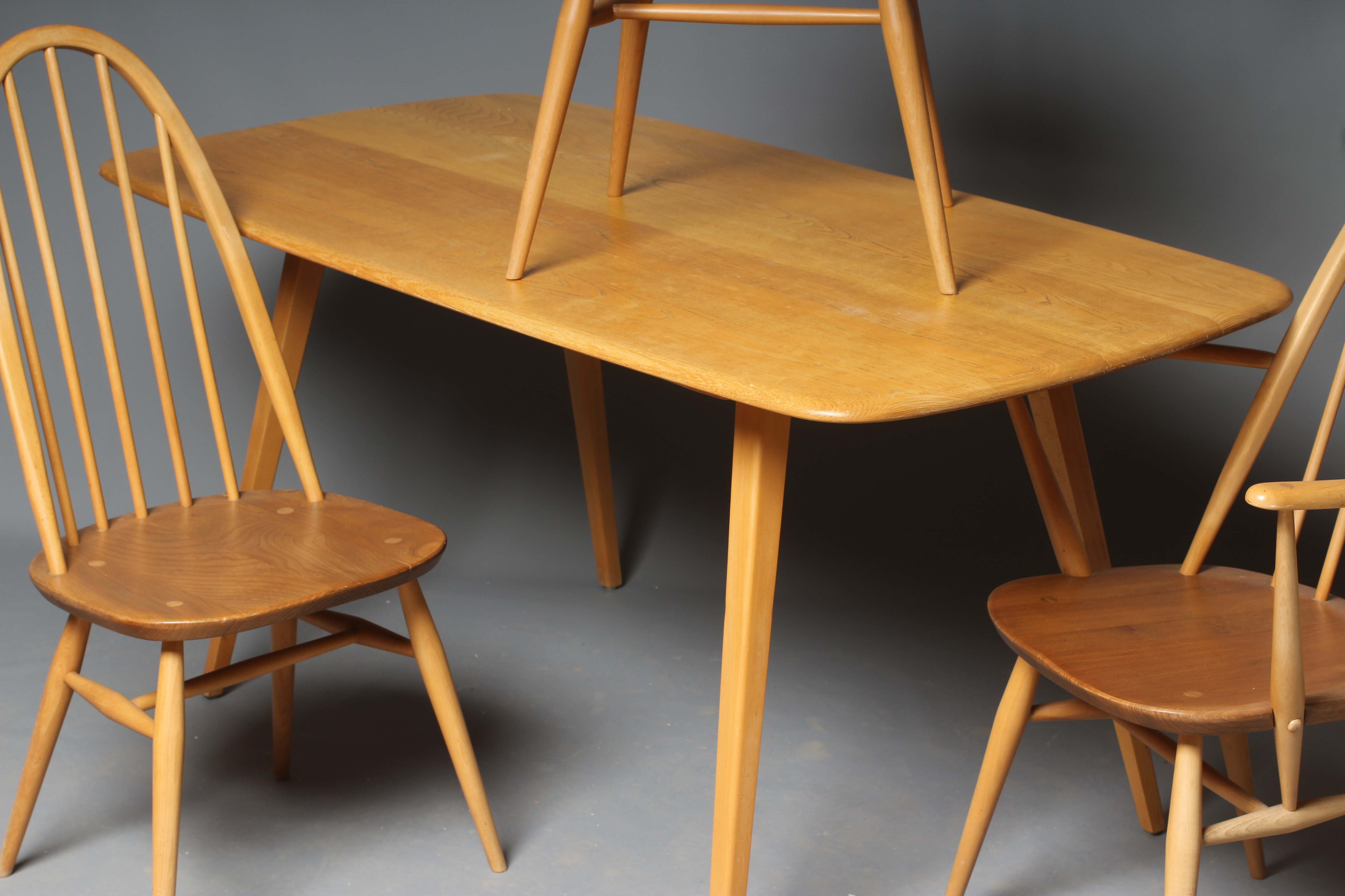 An ercol dining table and six chairs (4 + 2) | Hartleys Auctioneers ...