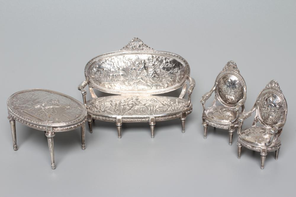 A DUTCH SILVER THREE PIECE SALON SUITE by Berthold Muller Image