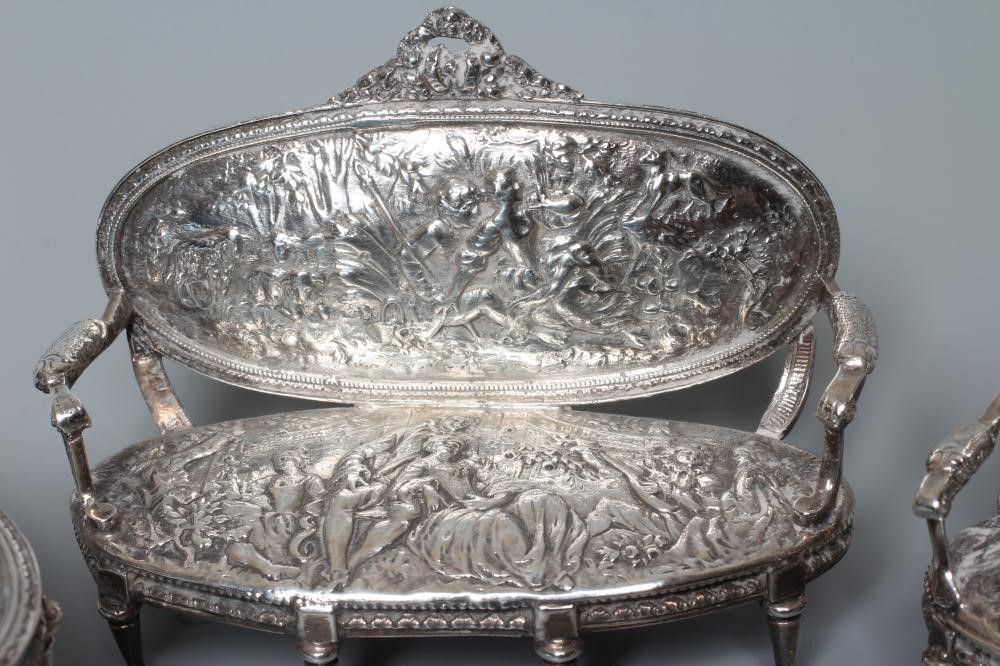 A DUTCH SILVER THREE PIECE SALON SUITE by Berthold Muller Image