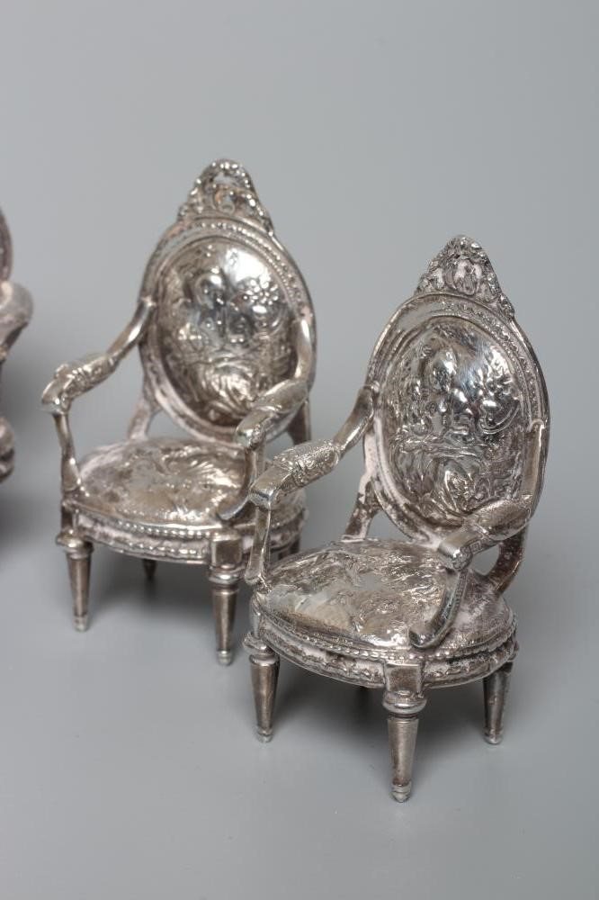 A DUTCH SILVER THREE PIECE SALON SUITE by Berthold Muller Image