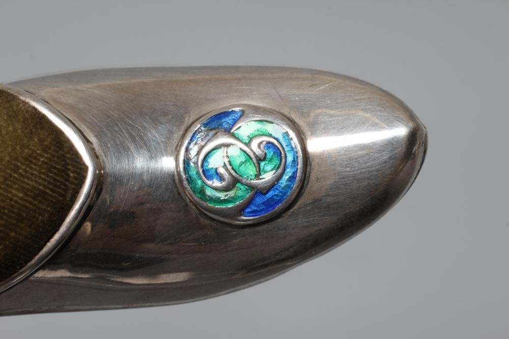 AN EDWARDIAN SILVER AND ENAMEL NOVELTY SHOE PIN CUSHION by William Haseler Image