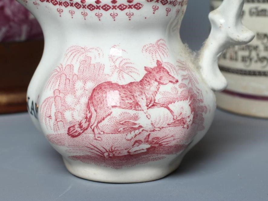 A CHILD'S EARLY VICTORIAN STAFFORDSHIRE POTTERY MINIATURE JUG Image