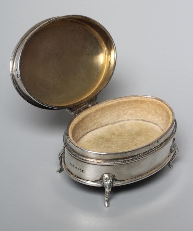 A GEORGE V OVAL SILVER DRESSING TABLE BOX by Mappin & Webb Image