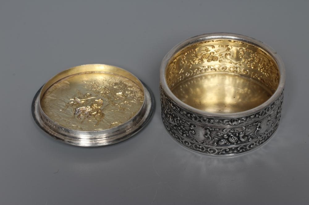 A LATE VICTORIAN SILVER CYLINDRICAL BOX AND COVER by Berthold Muller Image