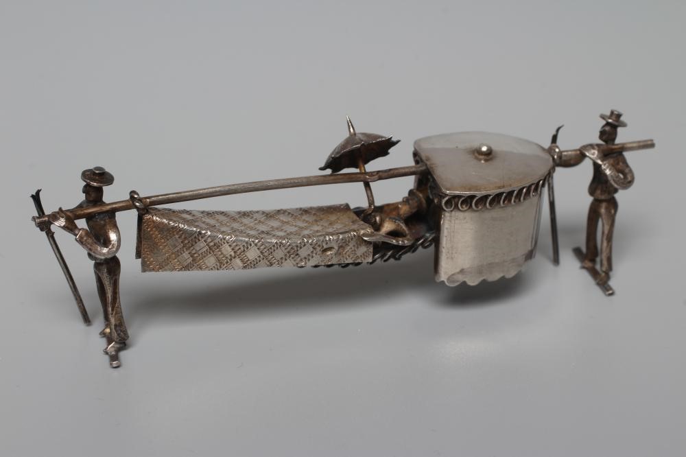 A SMALL SILVER COMPACT by Stockwell & Co. Image