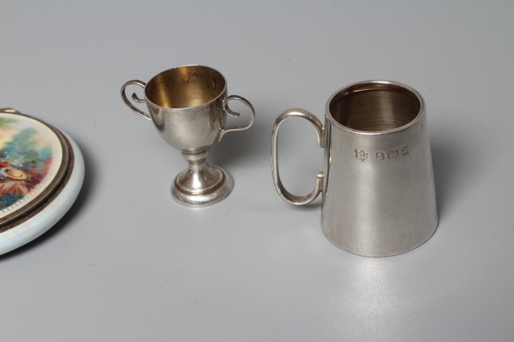 A SMALL SILVER COMPACT by Stockwell & Co. Image
