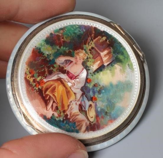 A SMALL SILVER COMPACT by Stockwell & Co. Image