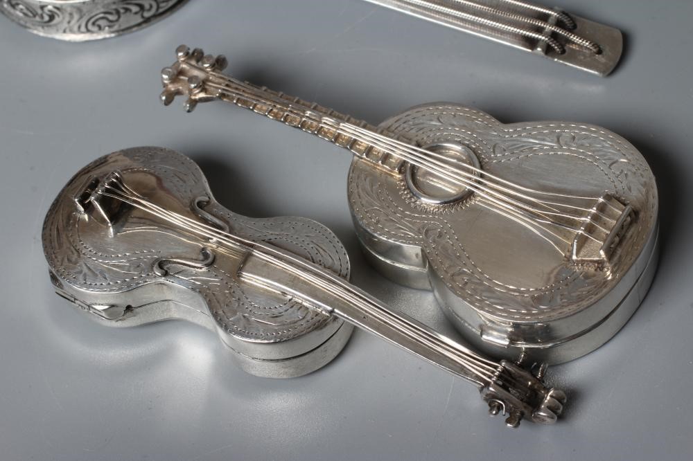 THREE MUSICAL INSTRUMENT NOVELTY BOXES comprising a silver guitar, Sheffield 1902, 3" long, an Image