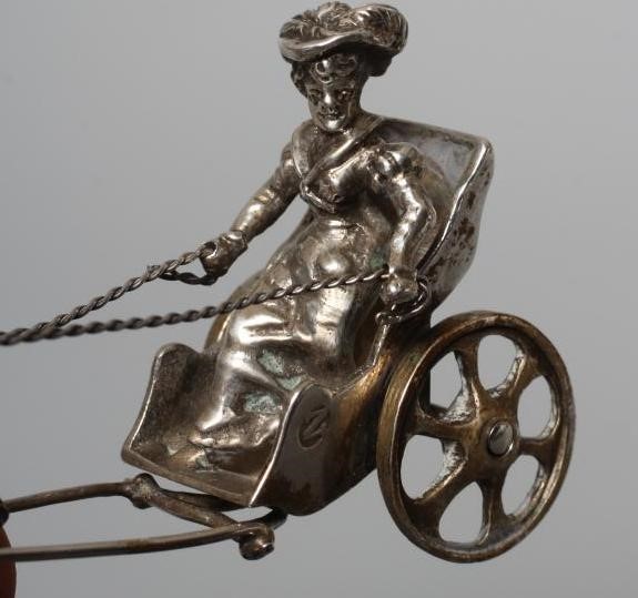 A FRENCH WHITE METAL CHARIOT Image