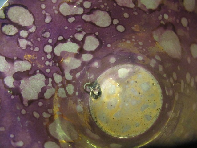 A COLLECTION OF PINK SPLASH LUSTRE POTTERY Image