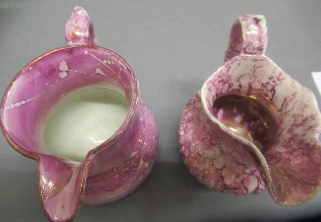 A COLLECTION OF PINK SPLASH LUSTRE POTTERY Image