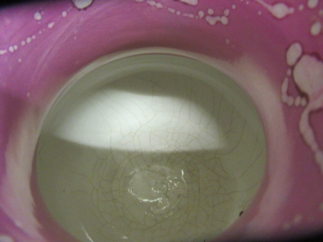 A COLLECTION OF PINK SPLASH LUSTRE POTTERY Image