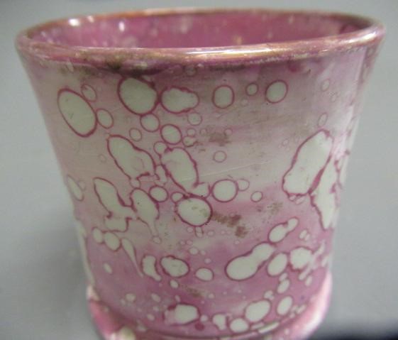 A COLLECTION OF PINK SPLASH LUSTRE POTTERY Image