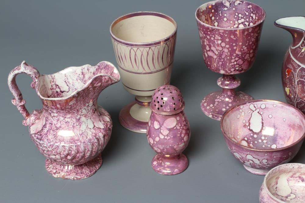 A COLLECTION OF PINK SPLASH LUSTRE POTTERY Image