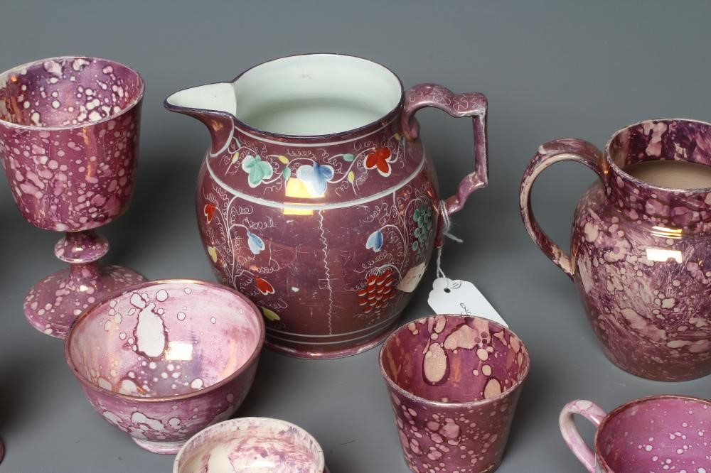 A COLLECTION OF PINK SPLASH LUSTRE POTTERY Image