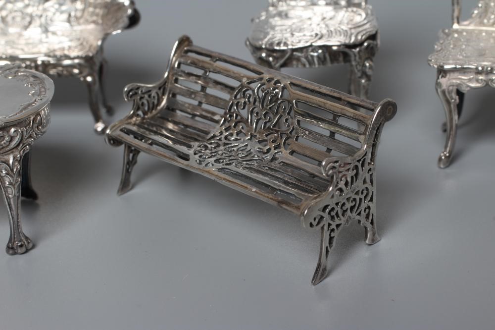 AN ELIZABETH II MINIATURE SILVER FOUR PIECE SALON SUITE by David Hollander & Son Image