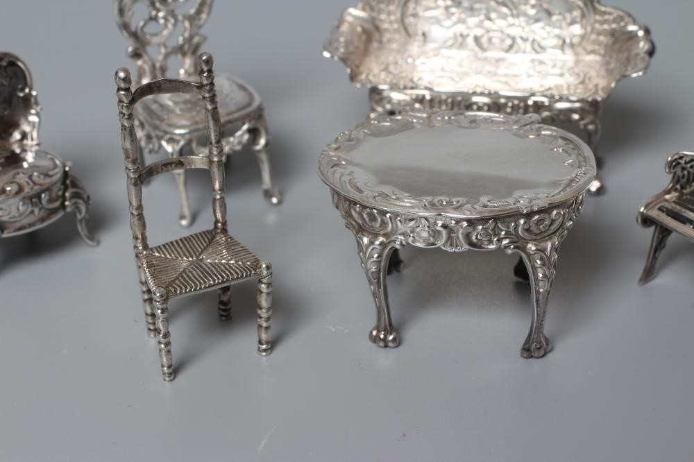 AN ELIZABETH II MINIATURE SILVER FOUR PIECE SALON SUITE by David Hollander & Son Image