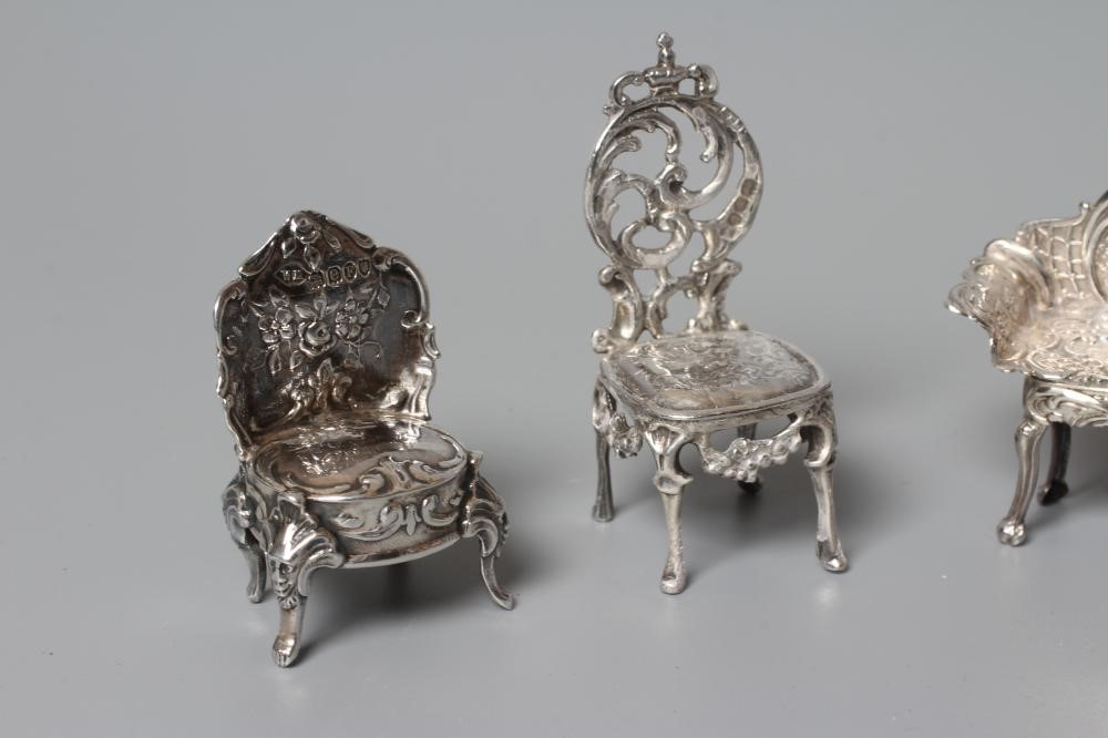 AN ELIZABETH II MINIATURE SILVER FOUR PIECE SALON SUITE by David Hollander & Son Image