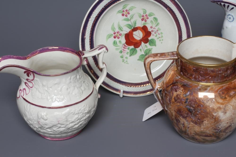 A STAFFORDSHIRE POTTERY JUG Image