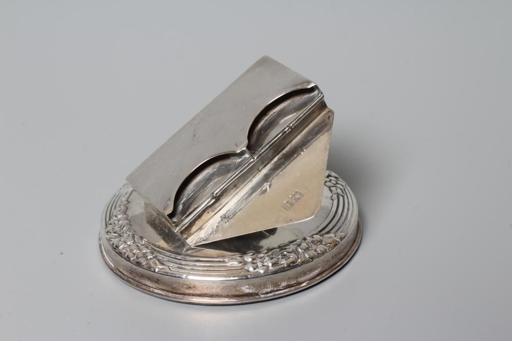 OF PHILATELIC INTEREST - AN EDWARDIAN NOVELTY DESK CLIP/PAPERWEIGHT Image
