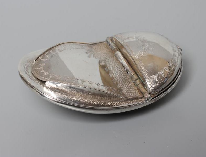 OF PHILATELIC INTEREST - A SNUFF/STAMP BOX, unmarked, of concave oval form with engraved decoration Image