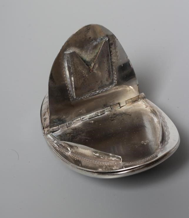 OF PHILATELIC INTEREST - A SNUFF/STAMP BOX, unmarked, of concave oval form with engraved decoration Image