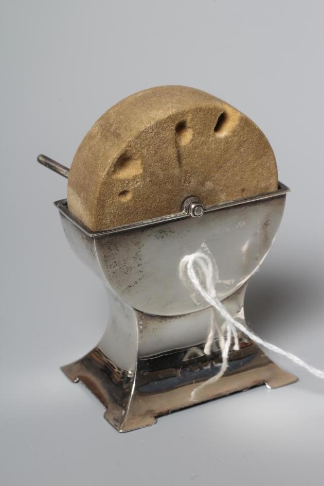 OF PHILATELIC INTEREST - AN EDWARDIAN SILVER NOVELTY KNIFE GRINDER STAMP SPONGE, maker's mark Image
