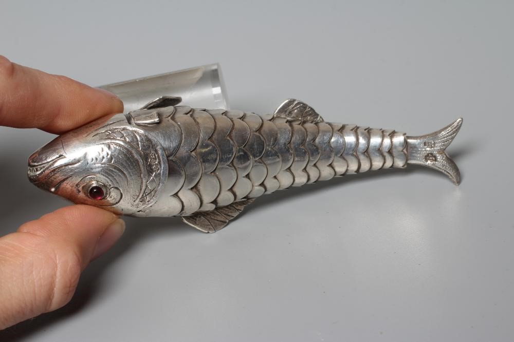 TWO SMALL SILVER ARTICULATED FISH BOXES, one Chester import 1903, with inset red glass eyes, 4" Image