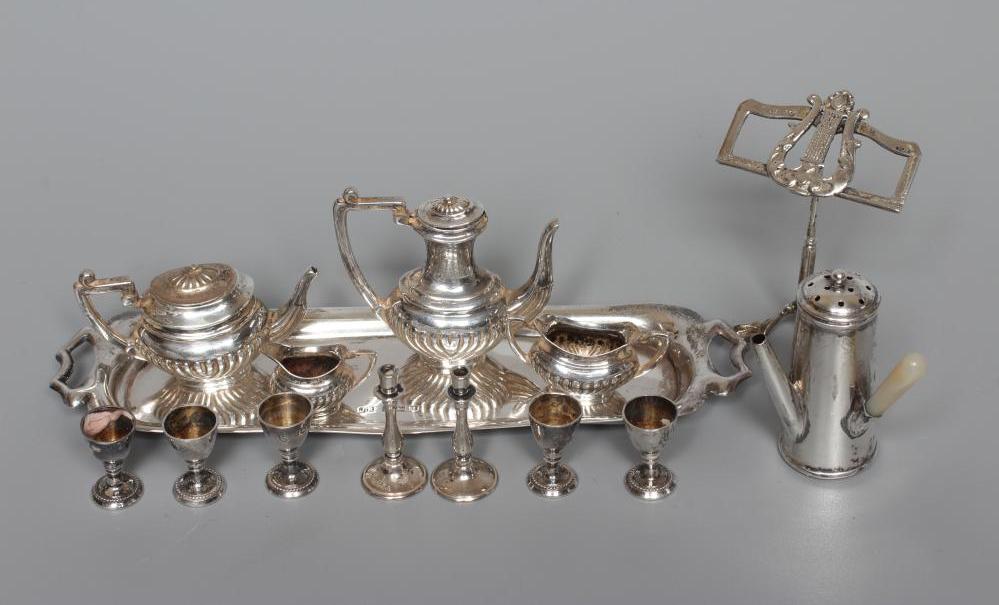 A COLLECTION OF SILVER TOYS comprising a novelty café-au-lait pepperette by William Vale Image