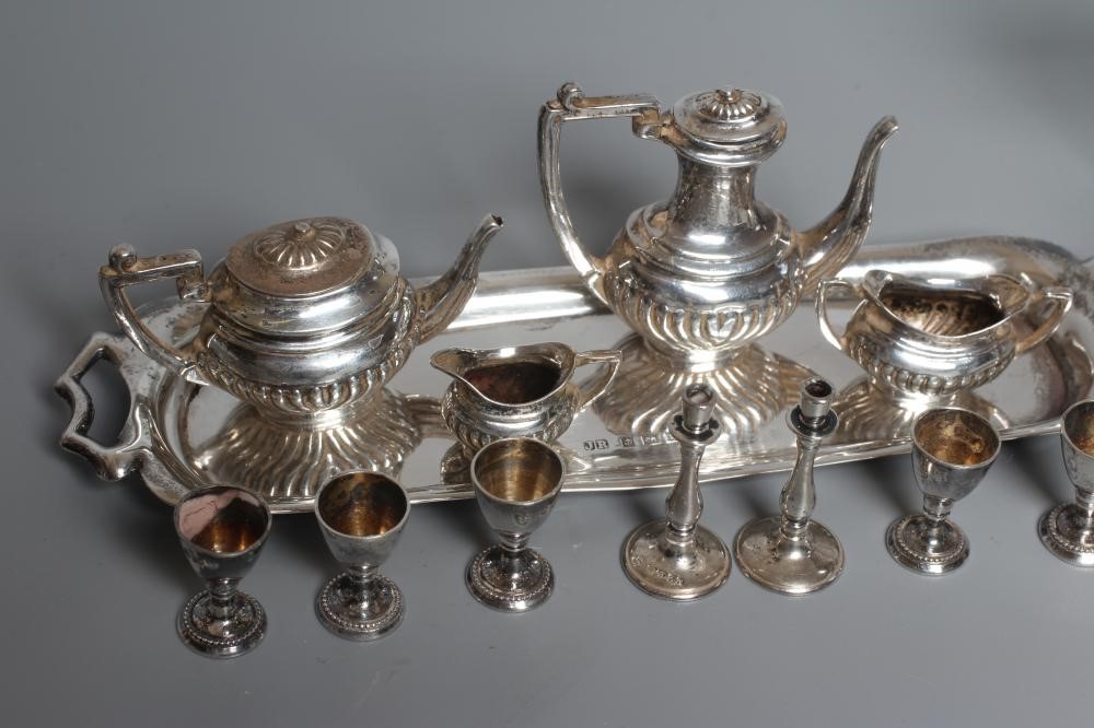A COLLECTION OF SILVER TOYS comprising a novelty café-au-lait pepperette by William Vale Image