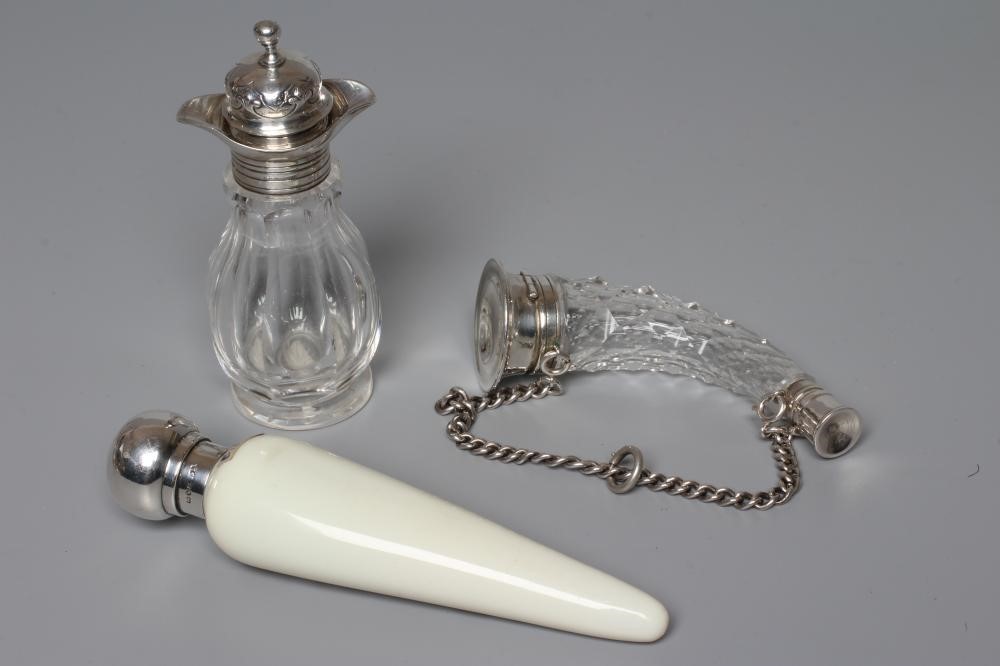 A THOMAS WEBB CREAM OPALINE GLASS SCENT FLASK of conical form with gilded flowers in the style of Image