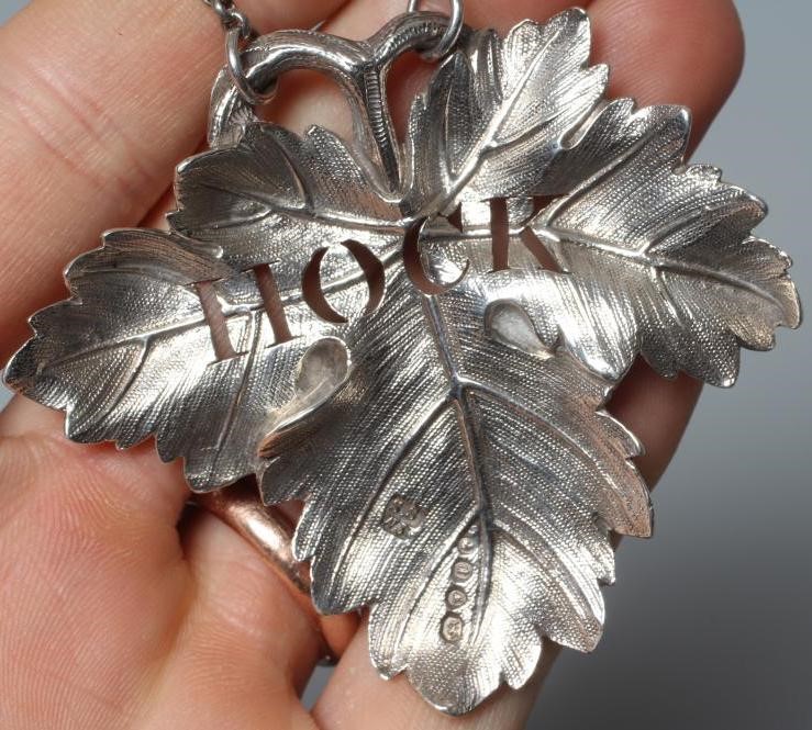 AN EARLY VICTORIAN SILVER HOCK LABEL by Smith, Nicholson & Co., London 1850, cast as a vine leaf, 2 Image